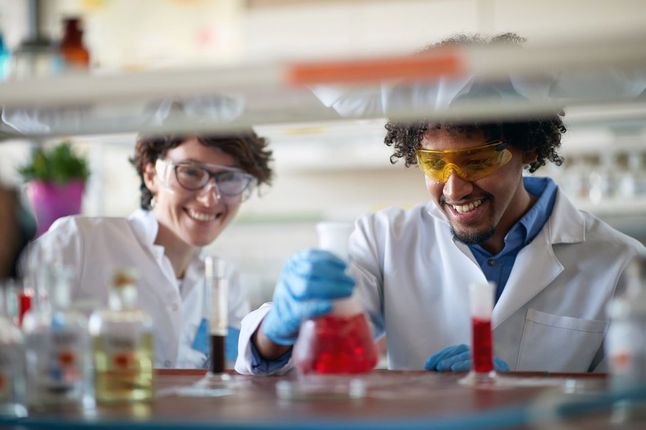 Colleagues working in laboratory